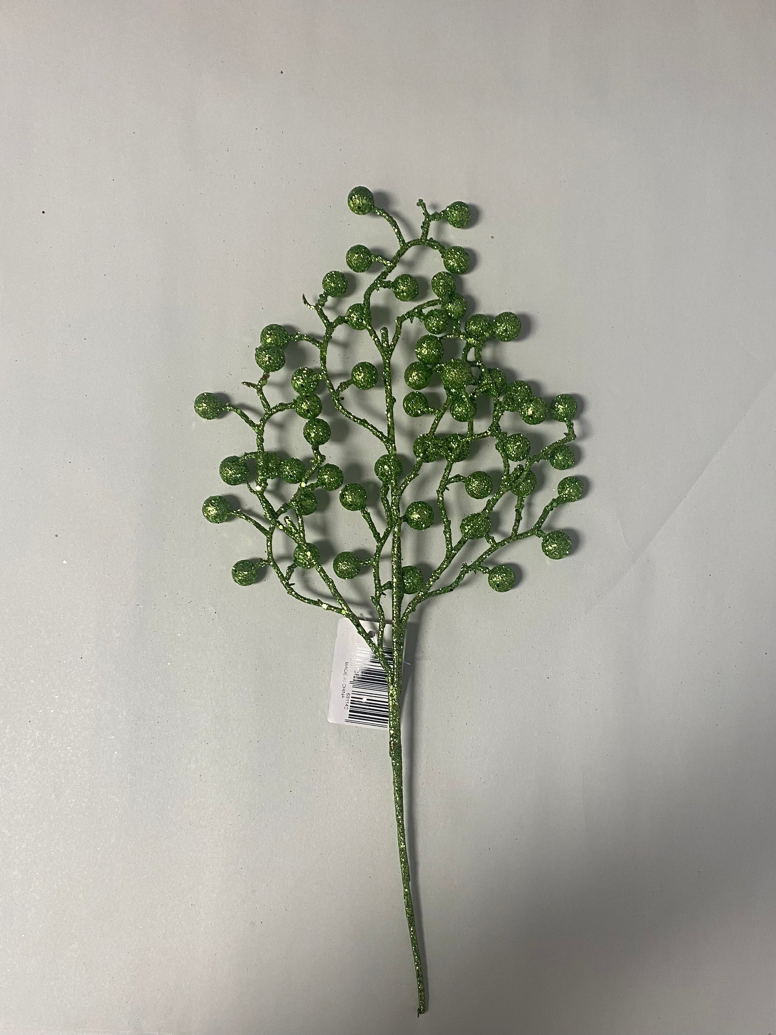 Green glitter ball pick